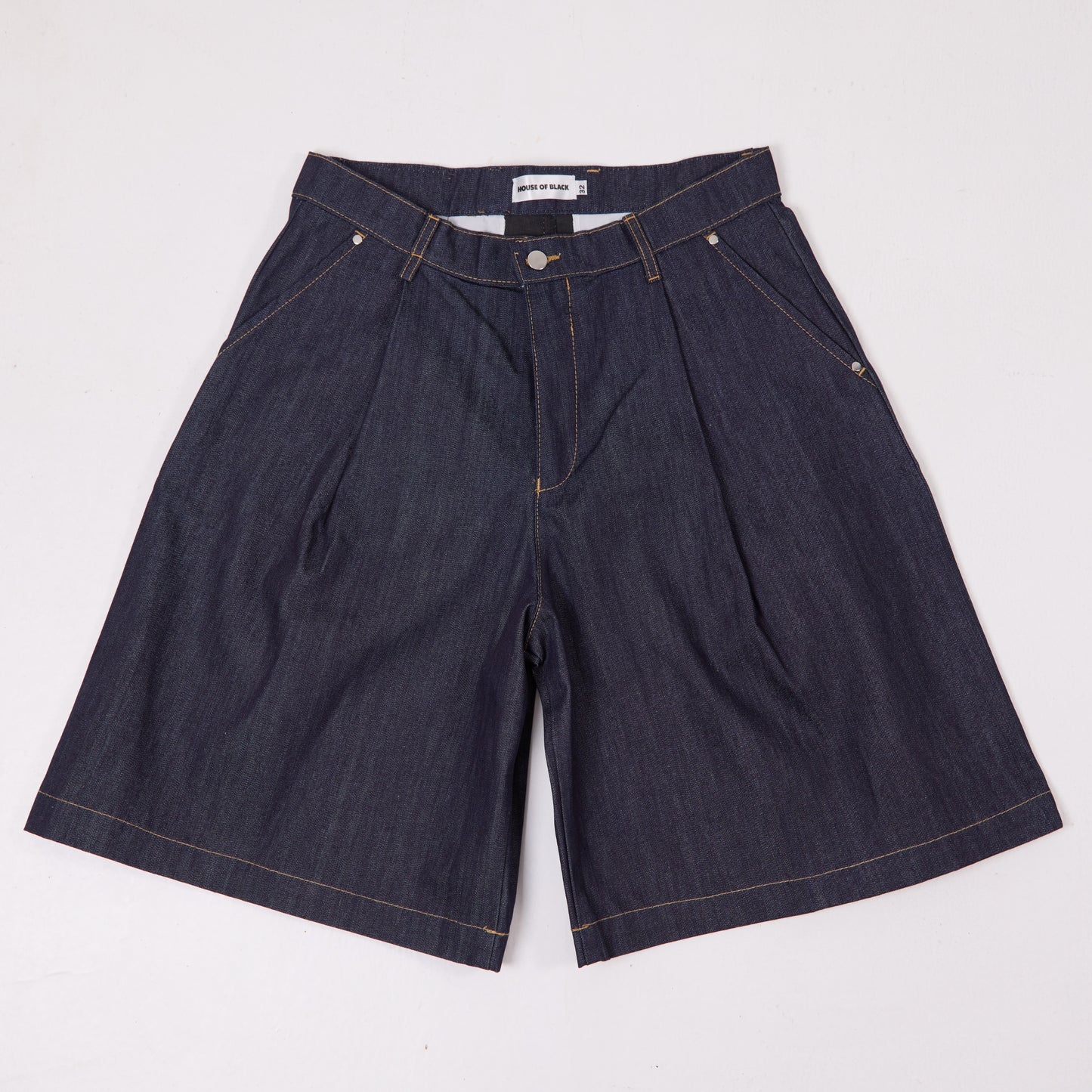 HOB raw denim pleated balloon jorts in indigo