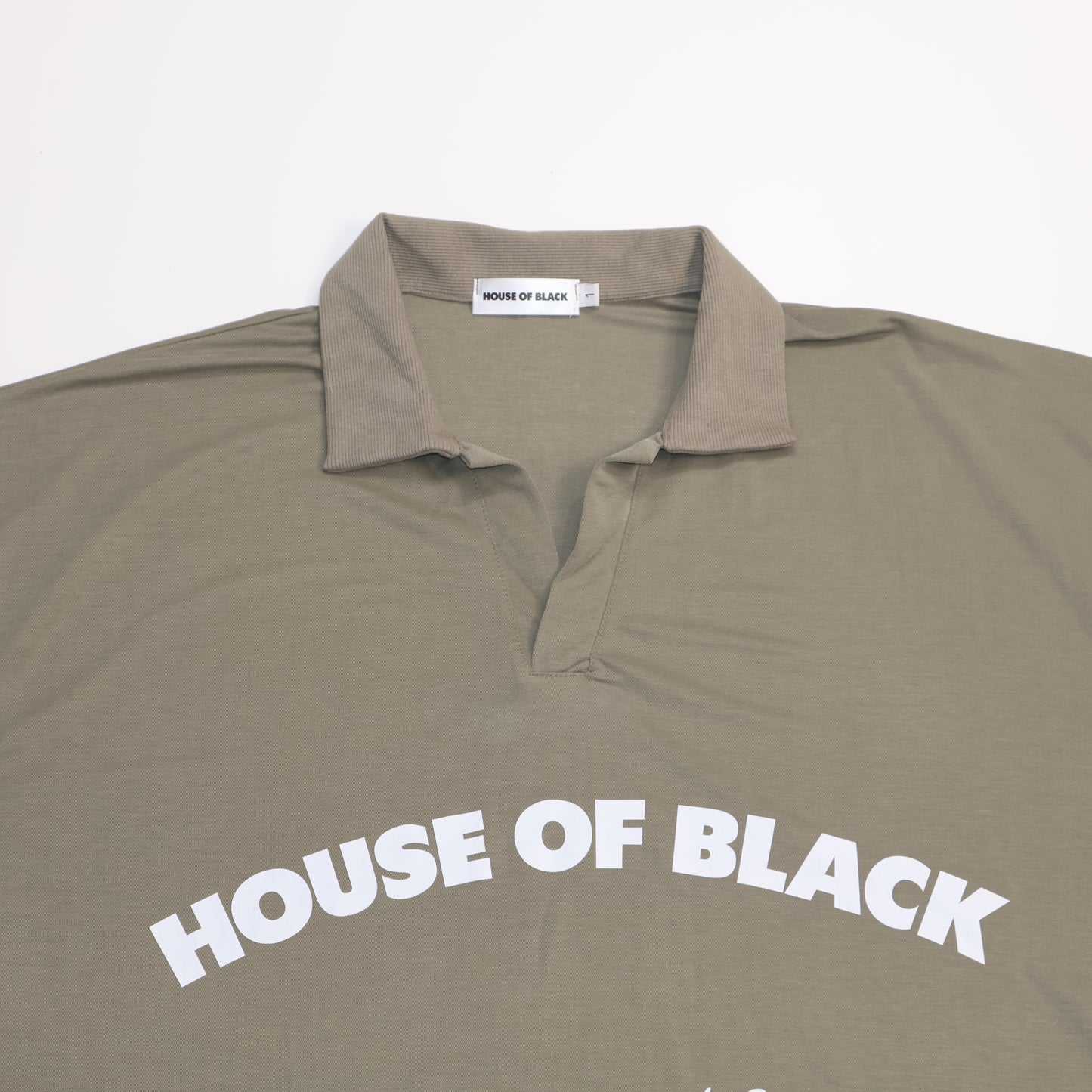 MAISON NOIR Green cropped polo shirt